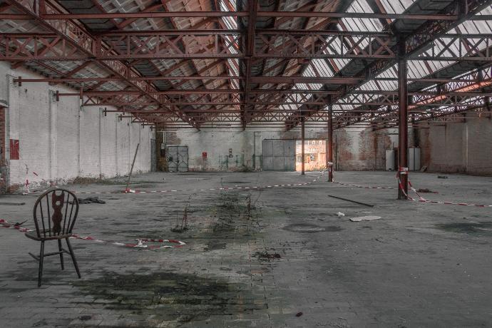 gray concrete building with red and white light
